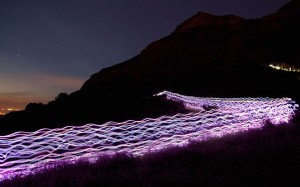 Endurance Runners And Walkers Create The Speed Of Light On Arthur's Seat As Part Of The Edinburgh Festival